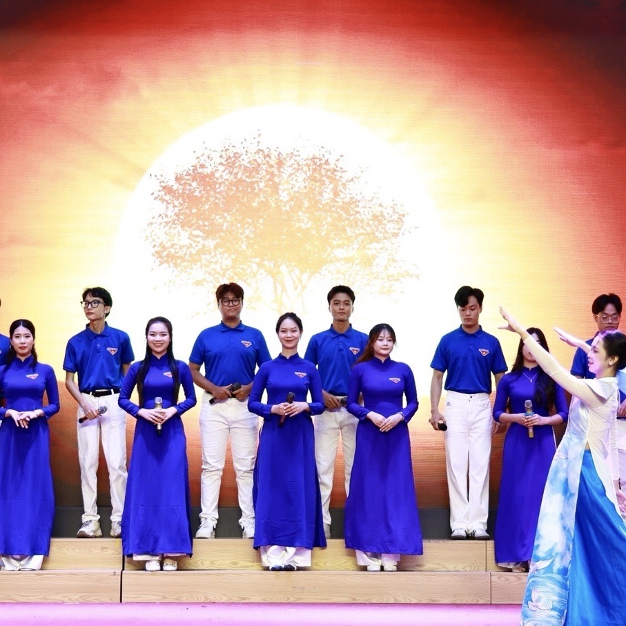 A group of people in blue shirts AI-generated content may be incorrect.